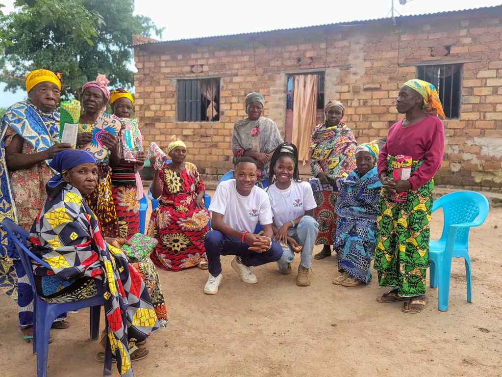 Hope G.C.L.M. team standing with community members in the Democratic Republic of Congo