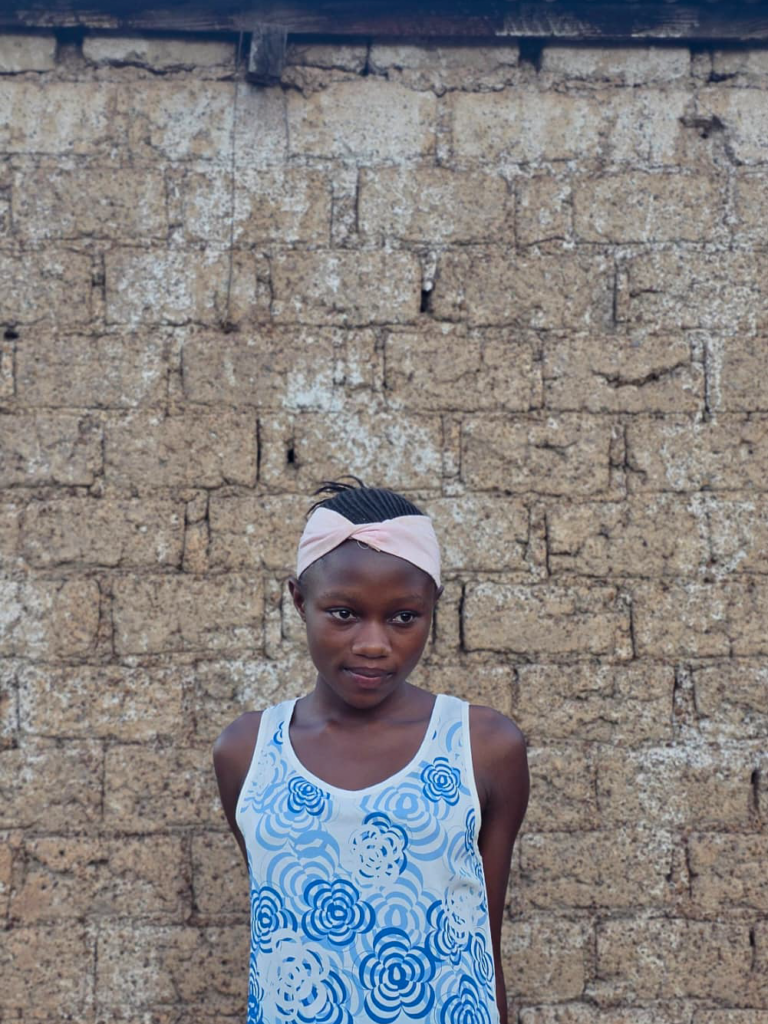 Sylvie, a fourteen-year-old girl supported through the education sponsorship programme
